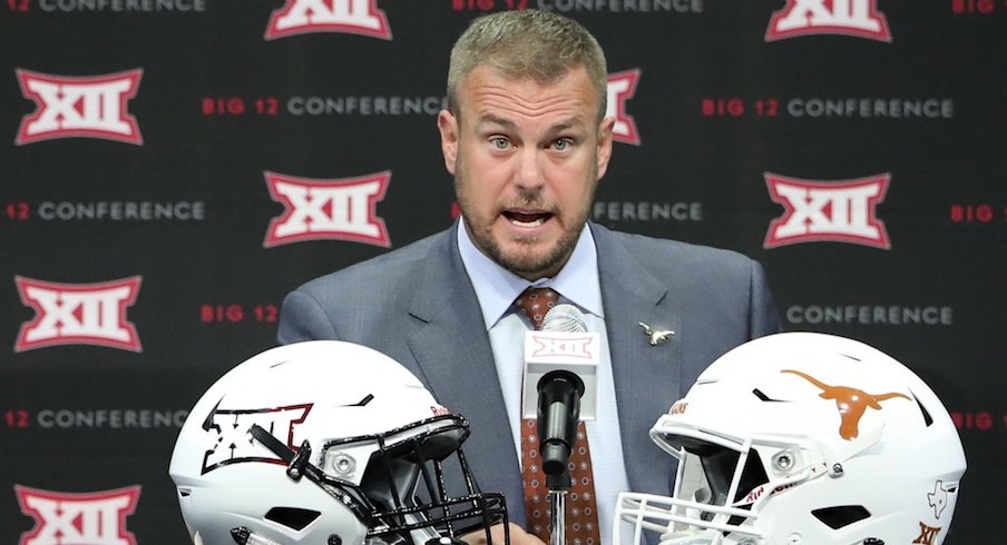 Tom Herman denies involvement.