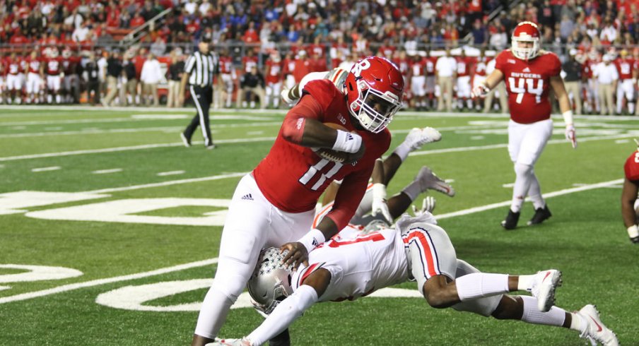 Ohio State's Denzel Ward tackles a Rutgers ball-carrier.