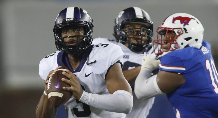 TCU Horned Frogs quarterback Shawn Robinson (3) scrambles for a touchdown in the third quarter against the Southern Methodist Mustangs at Gerald J. Ford Stadium.