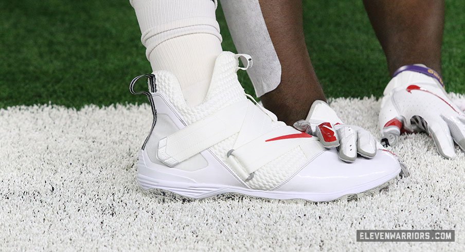 Custom white LeBron Soldier XII cleats for Ohio State football.