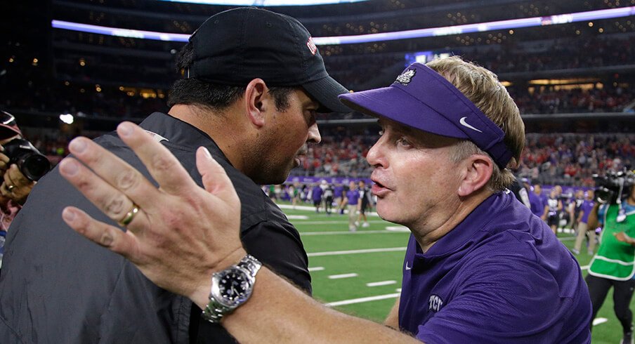 TCU coach Gary Patterson congratulates Ohio State coach Ryan Day following Ohio State's 40-28 win over the Horned Frogs.