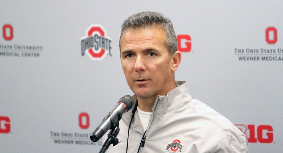 Former Head Breakfast Coach Urban Meyer at the podium.