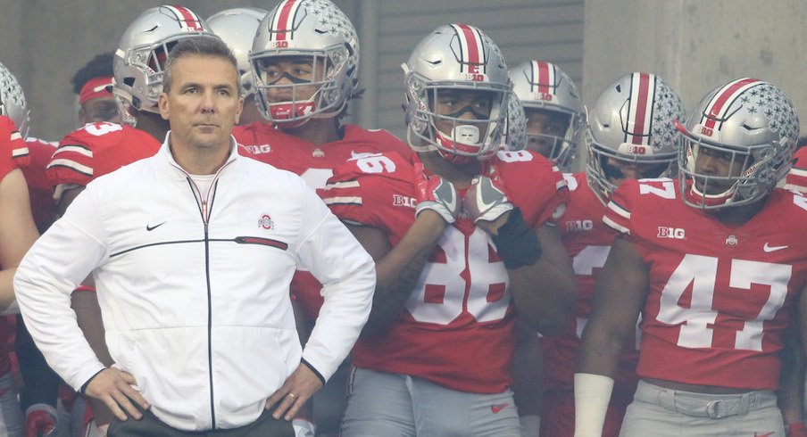 Urban Meyer and the Buckeyes before their 2017 game against Illinois at Ohio Stadium.