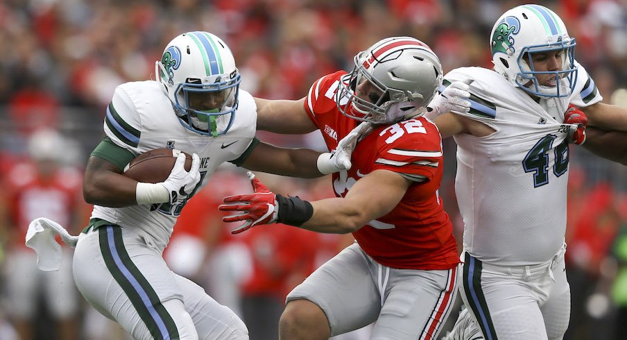 Tuf Borland attempts to make a tackle against Tulane.