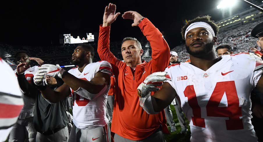 Jonathon Cooper, Urban Meyer and K.J. Hill during Carmen.