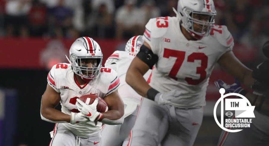 J.K. Dobbins looks for a crease.