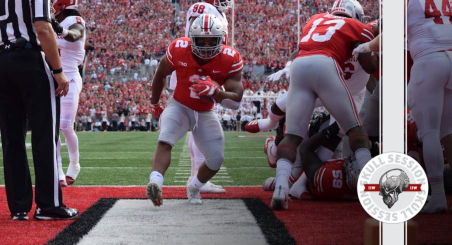 J.K. Dobbins walks into today's skull session.