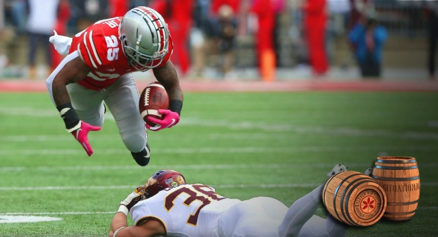 Oct 13, 2018; Columbus, OH, USA; Ohio State Buckeyes running back Mike Weber (25) get the first down over Minnesota Golden Gophers linebacker Blake Cashman (36) during the first quarter at Ohio Stadium. Mandatory Credit: Joe Maiorana-USA TODAY Sports