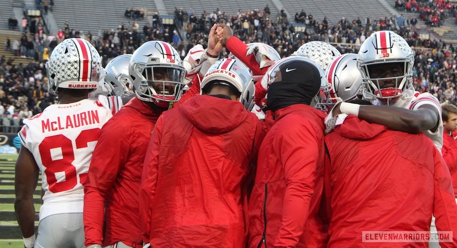 Ohio State wide receivers huddle before Saturday's game at Purdue.