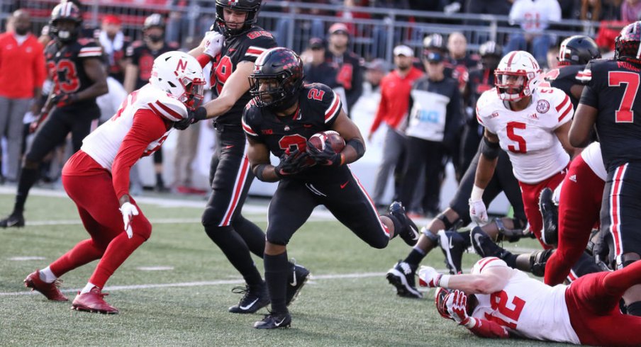 J.K. Dobbins squares up against an Nebraska defender. 