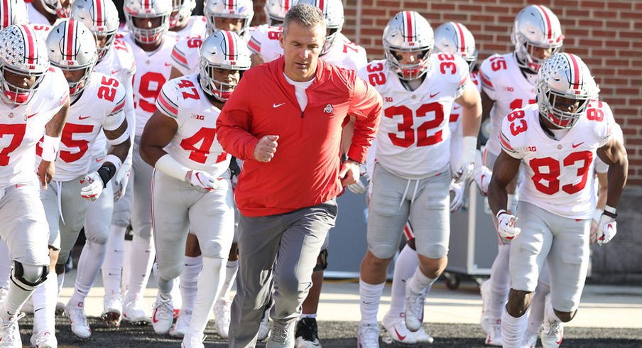 Urban Meyer running away from your tweets