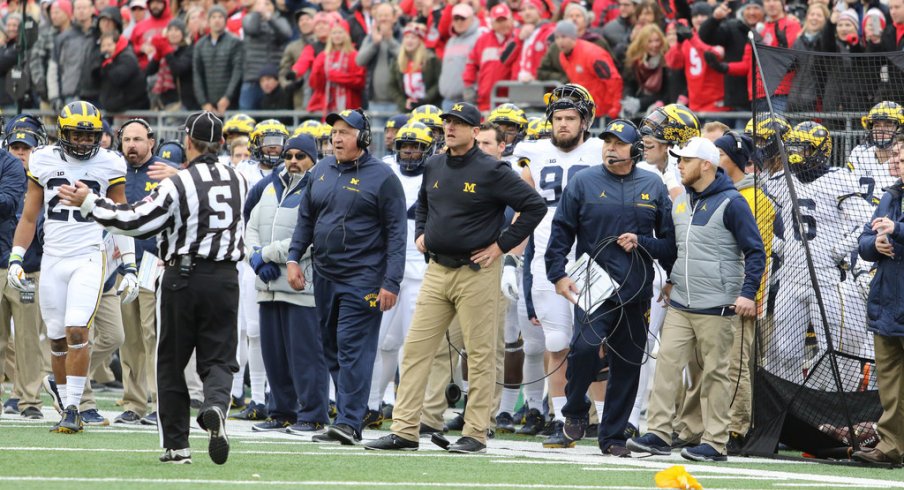 Jim Harbaugh watches in anguish as Ohio State drives down the field. 