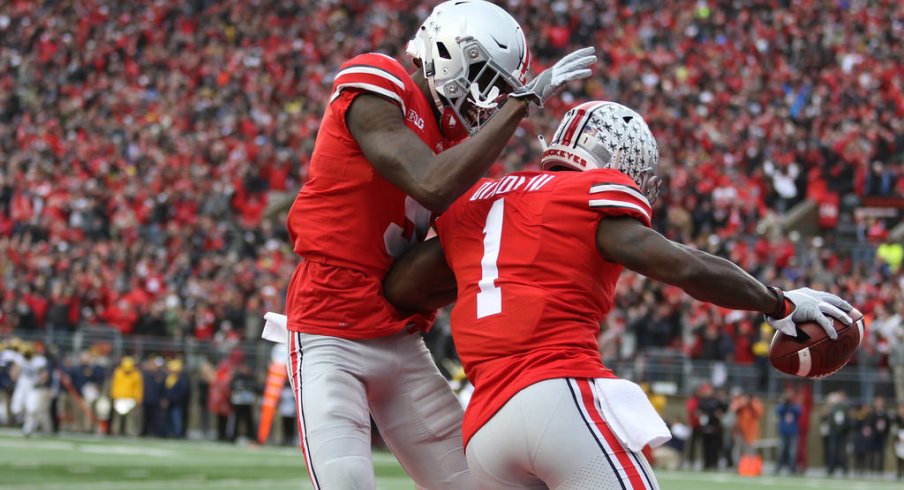 Victor and Dixon celebrate after a touchdown