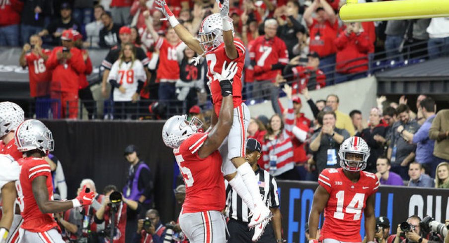 Chris Olave found the end zone again in Indianapolis.