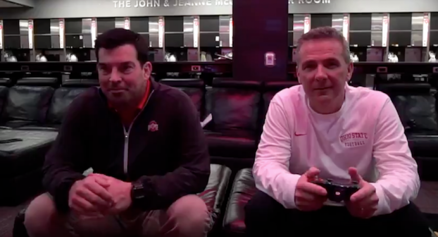 Urban Meyer passes the sticks to Ryan Day.