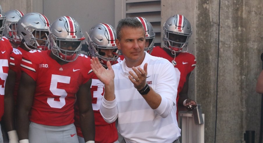 Urban Meyer and the Buckeyes before a game this season.