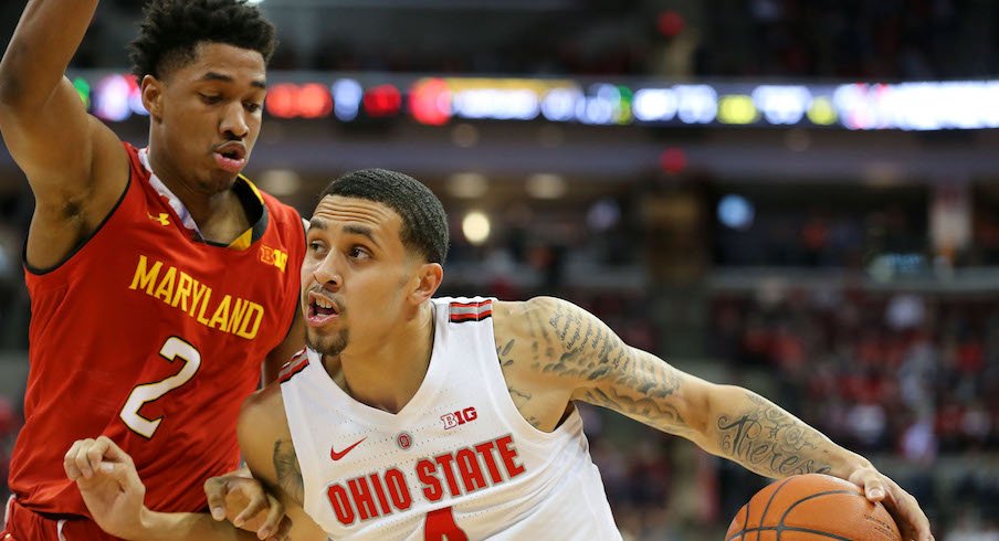 Duane Washington drives against a Maryland defender