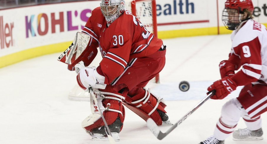 Buckeye goalie Sean Romeo battles the Wisconsin Badgers in a 2-1 overtime victory. 