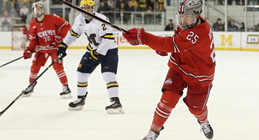 Buckeye senior Brendon Kearney shoots the puck in a 4-2 loss at Michigan. 