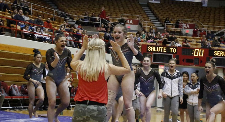 Buckeyes celebrate after a huge performance by Morgan Lowe. 