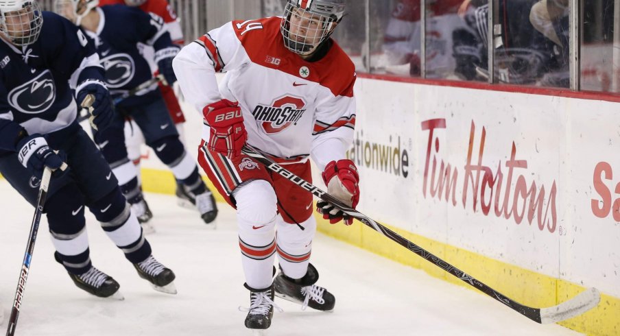 Buckeye forward Austin Pooley makes a pass in a game against Penn State.