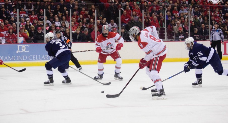 Ohio State's Dakota Joshua connects with a pass in the Big Ten Hockey semifinals against Penn State.