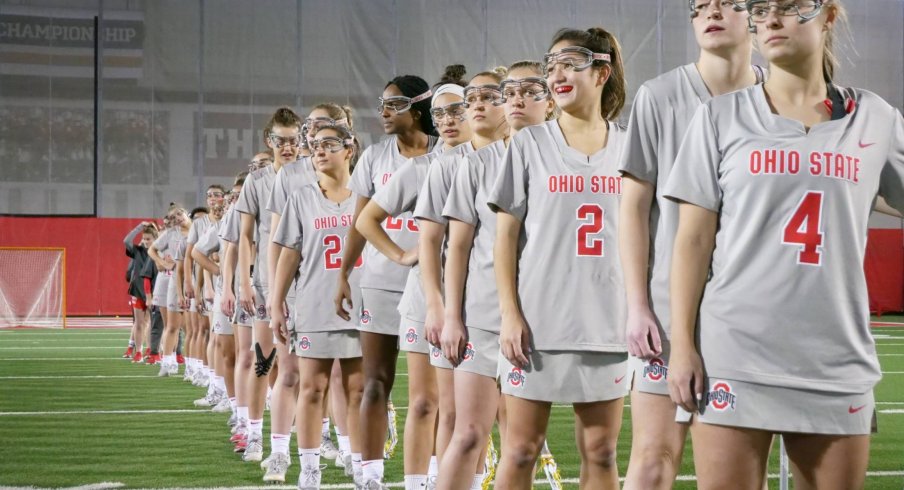 The women's lacrosse team prepares for its upcoming match. 