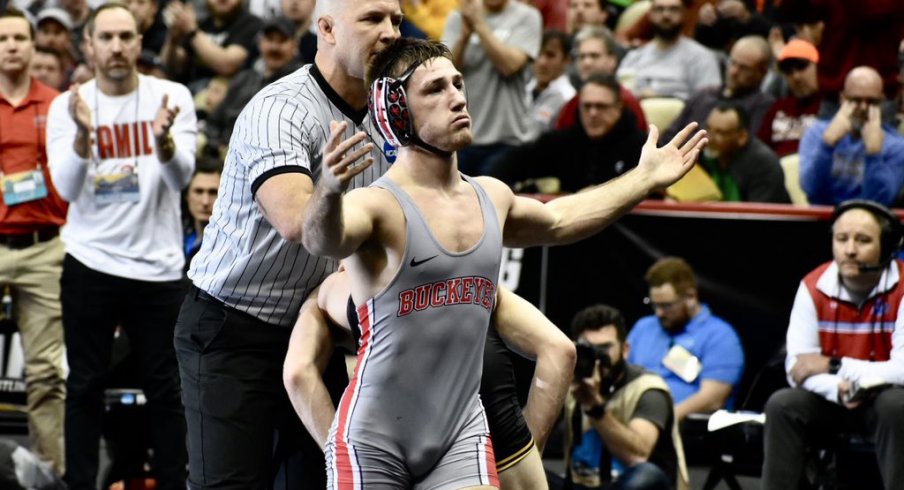 Luke Pletcher celebrates his victory over Austin DeSanto