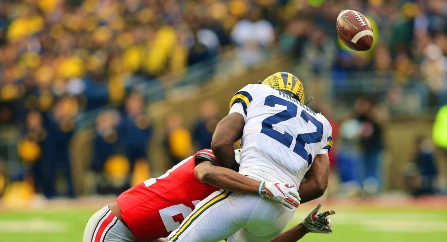 Nov 24, 2018; Columbus, OH, USA; Ohio State Buckeyes cornerback Shaun Wade (24) breaks up a pass intended for Michigan Wolverines running back Karan Higdon (22) during the third quarter at Ohio Stadium. Mandatory Credit: Joe Maiorana-USA TODAY Sports