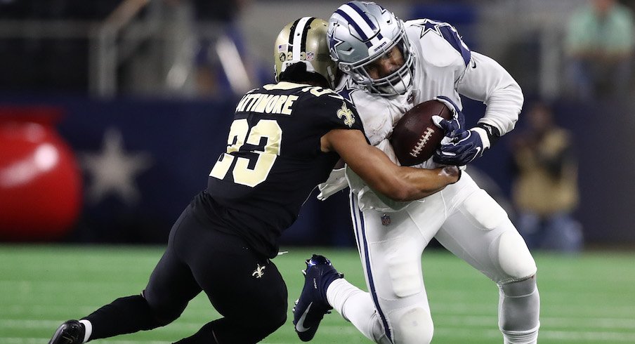 Marshon Lattimore tackling Ezekiel Elliott