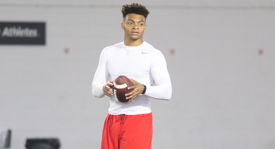 Justin Fields worked at the Woody Hayes Athletic Center with many of Ohio State's wide receivers on Thursday.