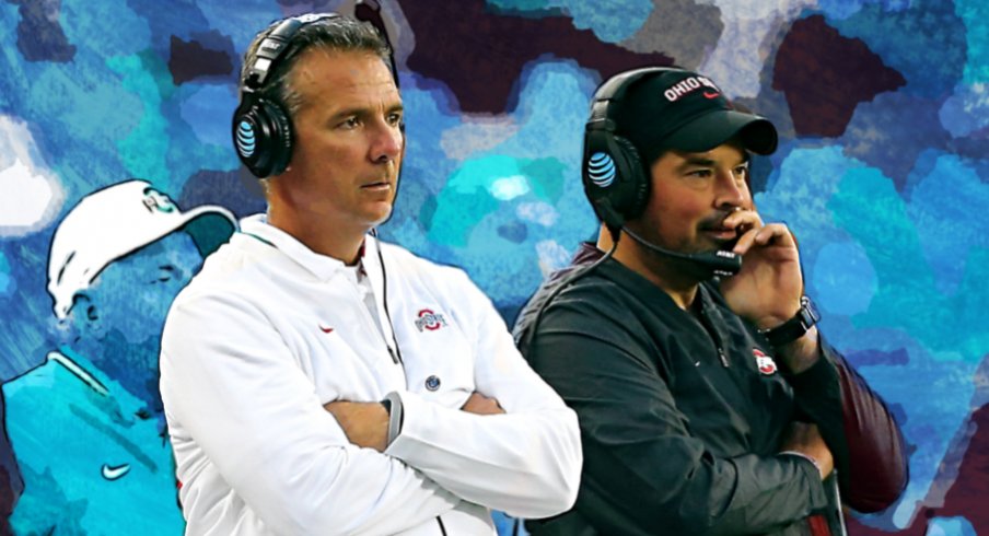 Sep 22, 2018; Columbus, OH, USA; Ohio State Buckeyes head coach Urban Meyer (center) watches the game from the sidelines with assistant coach Ryan Day (right) and assistant coach Tony Alford (left) during the third quarter against the Ohio State Buckeyes at Ohio Stadium. Mandatory Credit: Joe Maiorana-USA TODAY Sports