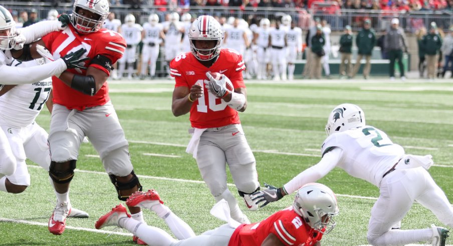 Barrett runs one in for a touchdown against Michigan State. 