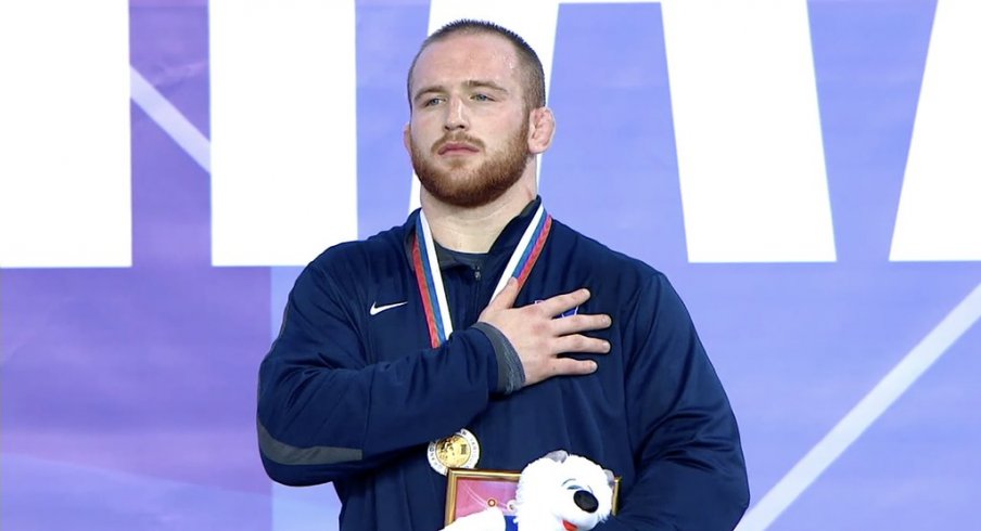 Snyder is awarded his gold medal. 