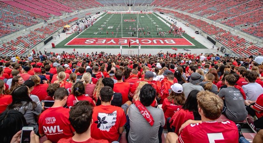 Ohio State students watch practice inside Ohio Stadium.