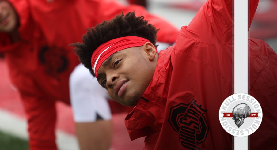 Justin Fields is stretching in today's skull session.