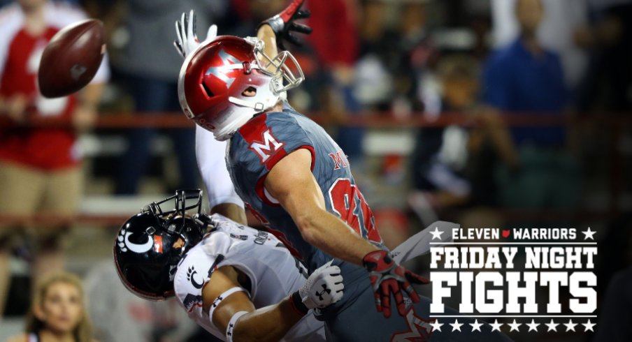 Sep 16, 2017; Oxford, OH, USA; Cincinnati Bearcats safety Malik Clements (4) defends against Miami (Oh) Redhawks wide receiver Luke Mayock (86) in the second half at Fred Yager Stadium. Mandatory Credit: Aaron Doster-USA TODAY Sports