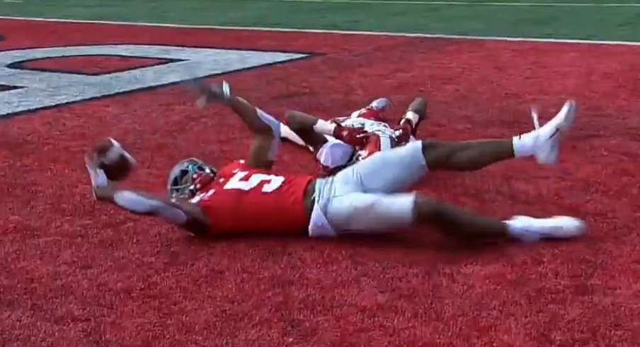 Ohio State wideout Garrett Wilson makes a touchdown catch against the Miami Redhawks