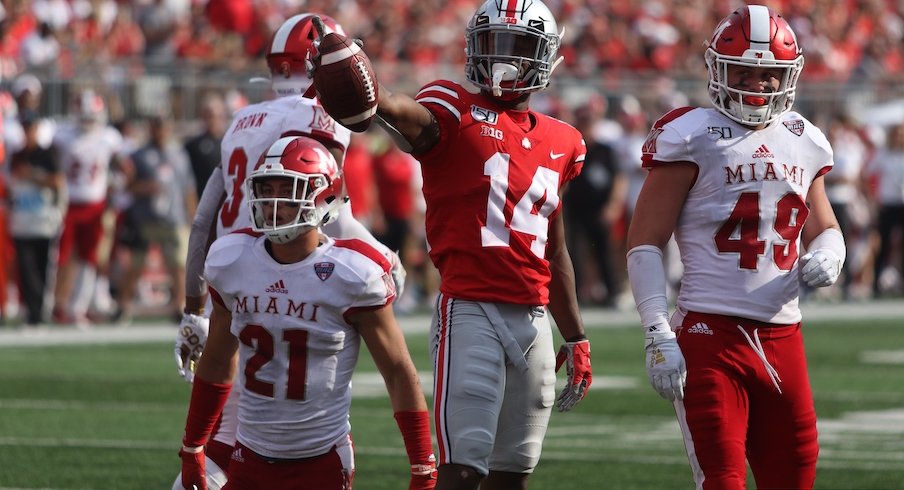 K.J. Hill celebrates after a catch.