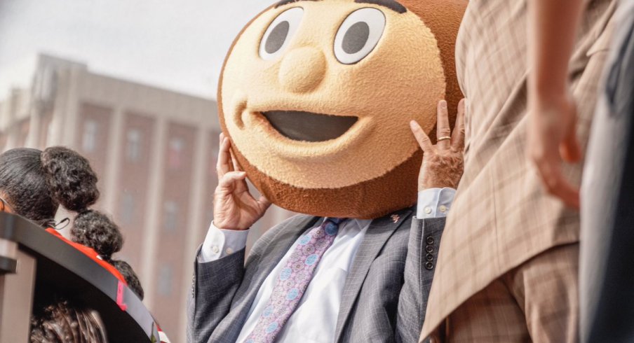 Corso wearing the Brutus headgear as he selects Ohio State in tonight's game. 