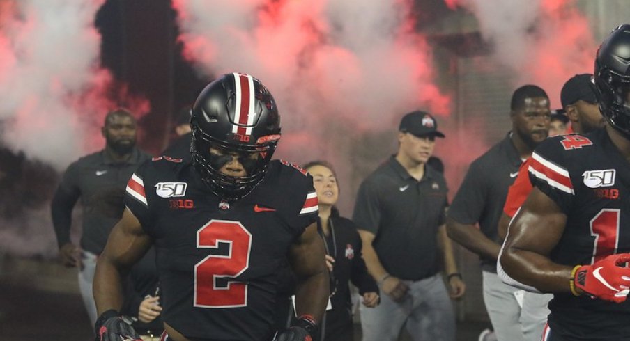 J.K. Dobbins takes the field.