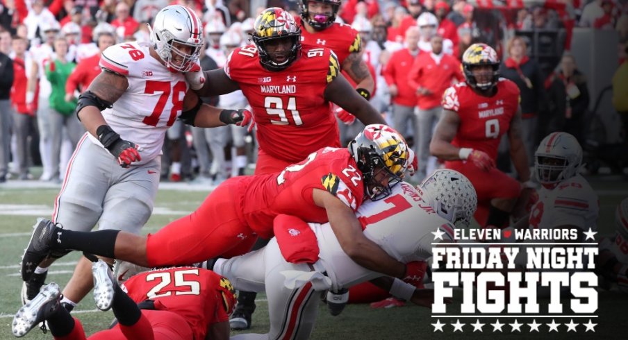 Nov 17, 2018; College Park, MD, USA; Ohio State Buckeyes quarterback Dwayne Haskins (7) dives for the game winning touchdown in overtime against the Maryland Terrapins at Capital One Field at Maryland Stadium. Mandatory Credit: Mitch Stringer-USA TODAY Sports