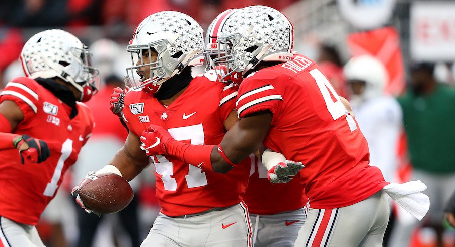 Justin Hilliard celebrates his interception.