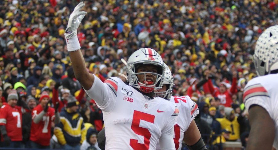 Garrett Wilson celebrates during Ohio State's 56-27 win over Michigan.