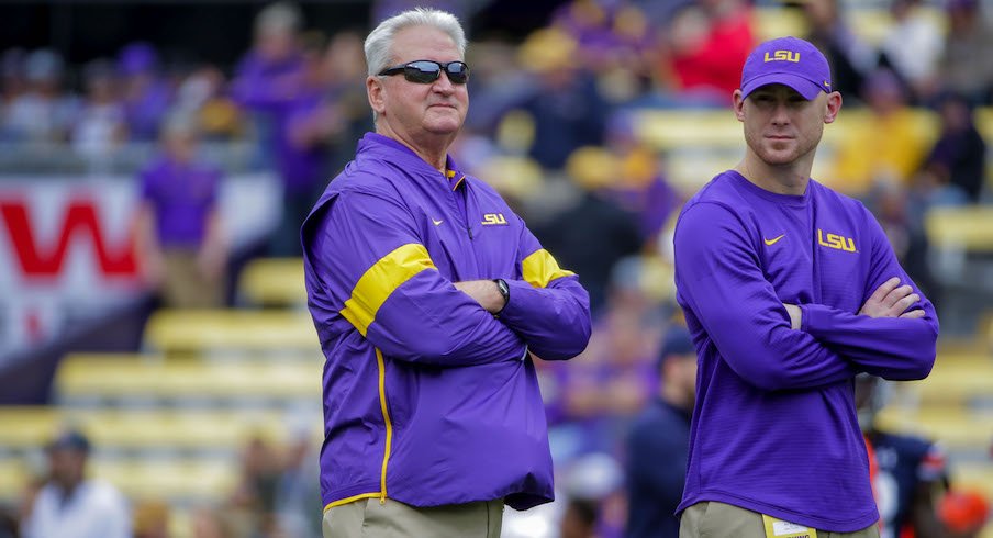 LSU offensive coordinators Steve Ensminger and Joe Brady (right)