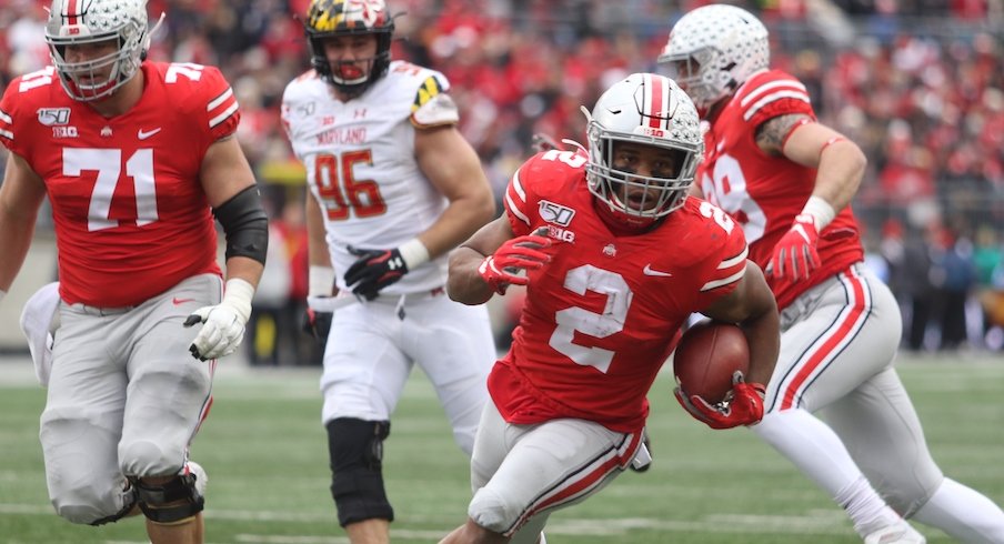 J.K. Dobbins running the ball against Maryland.