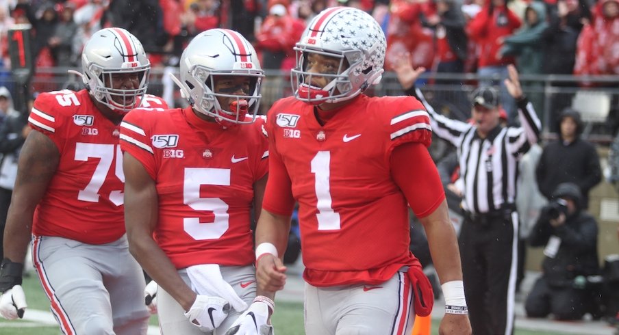 Thayer Munford, Garrett Wilson and Justin Fields