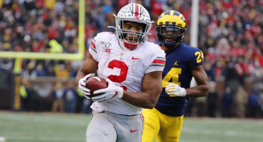 Nov 30, 2019; Ann Arbor, MI, USA; Ohio State Buckeyes running back J.K. Dobbins (2) rushes for a touchdown in the second half against the Michigan Wolverines at Michigan Stadium. Mandatory Credit: Rick Osentoski-USA TODAY Sports