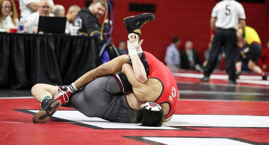 Malik Heinselman pins Minnesota's Patrick McKee at the Big Ten Tournament.