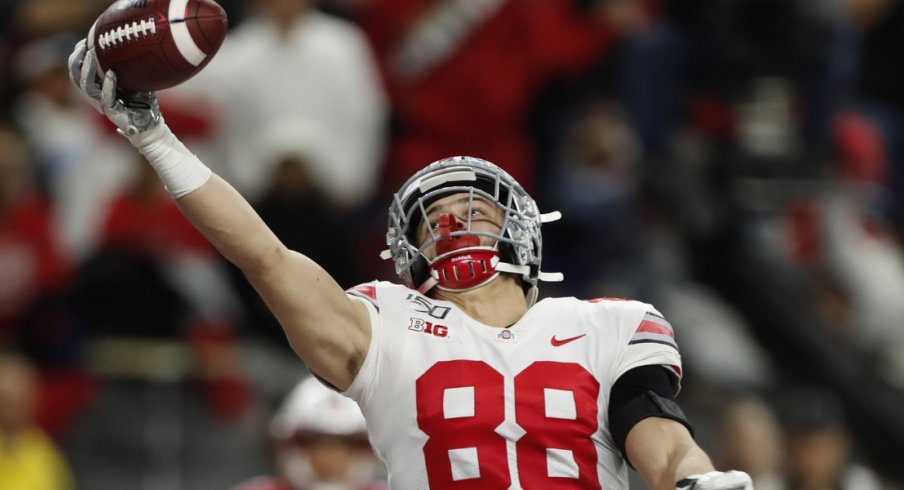 Dec 7, 2019; Indianapolis, IN, USA; Ohio State Buckeyes tight end Jeremy Ruckert (88) makes a one handed catch in the end zone for a touchdown against the Wisconsin Badgers during the third quarter in the 2019 Big Ten Championship Game at Lucas Oil Stadium. Mandatory Credit: Brian Spurlock-USA TODAY Sports